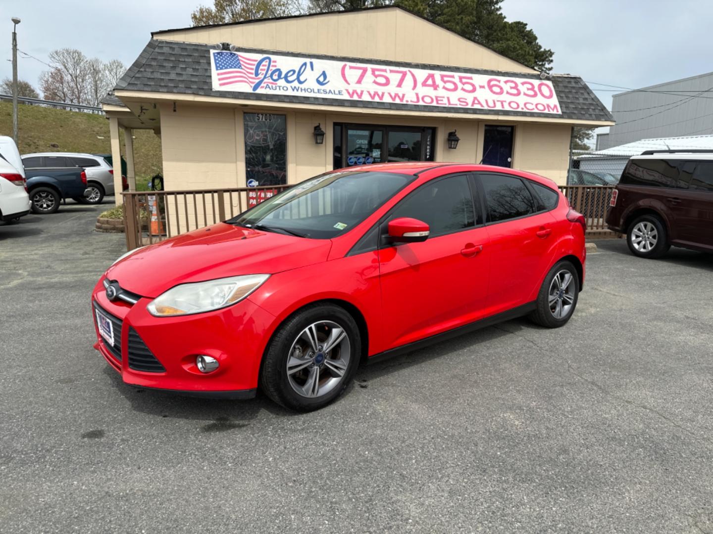 2014 Red Ford Focus (1FADP3K21EL) , Automatic transmission, located at 5700 Curlew Drive, Norfolk, VA, 23502, (757) 455-6330, 36.841885, -76.209412 - Photo#0